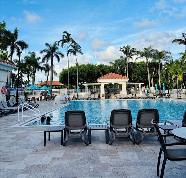 9725NW NW 52nd St Unit 415, Doral, FL 33178 - community pool featuring a patio area