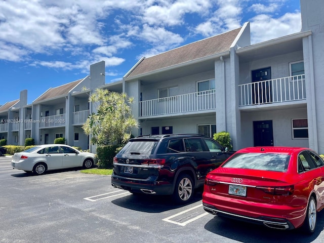2860 SW 22nd Ave Unit 4100, Delray Beach, FL 33445 - view of property featuring uncovered parking