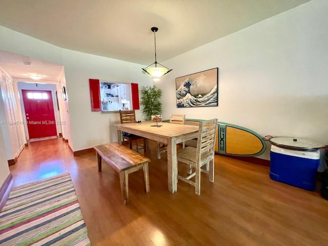 2860 SW 22nd Ave Unit 4100, Delray Beach, FL 33445 - dining space featuring wood finished floors and baseboards