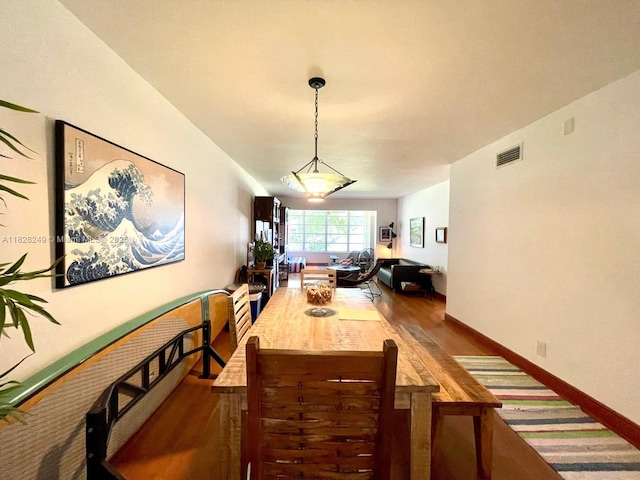 2860 SW 22nd Ave Unit 4100, Delray Beach, FL 33445 - dining space featuring wood finished floors and baseboards