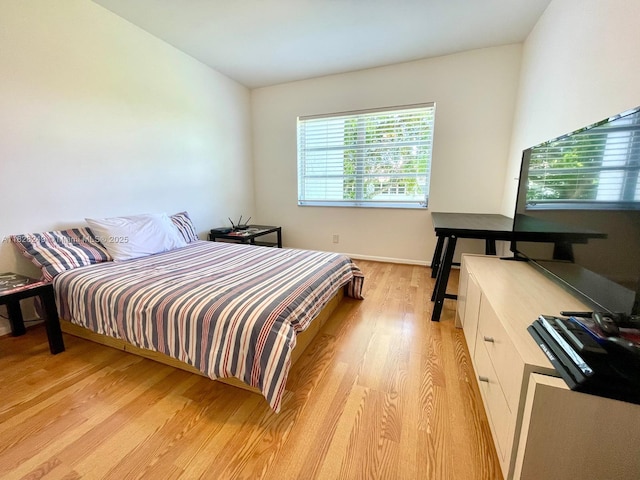 2860 SW 22nd Ave Unit 4100, Delray Beach, FL 33445 - bedroom with light wood-style flooring