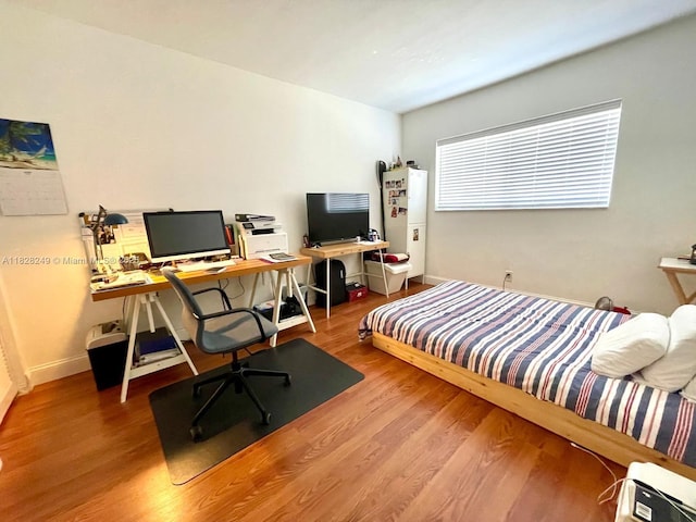 2860 SW 22nd Ave Unit 4100, Delray Beach, FL 33445 - bedroom featuring wood finished floors and an office area