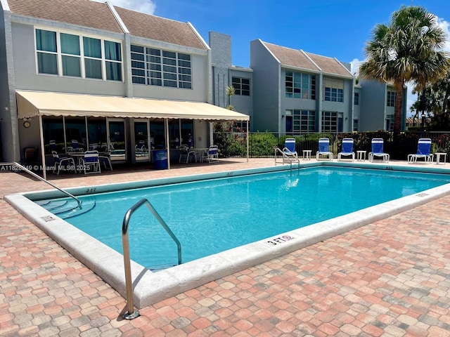 2860 SW 22nd Ave Unit 4100, Delray Beach, FL 33445 - community pool with a patio