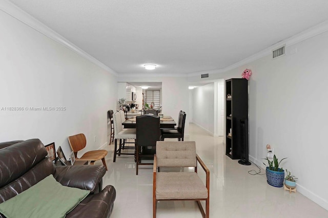9917 W Okeechobee Rd Unit 3-303, Hialeah Gardens, FL 33016 - dining space with ornamental molding and baseboards