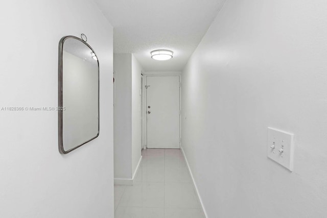 9917 W Okeechobee Rd Unit 3-303, Hialeah Gardens, FL 33016 - hall with baseboards