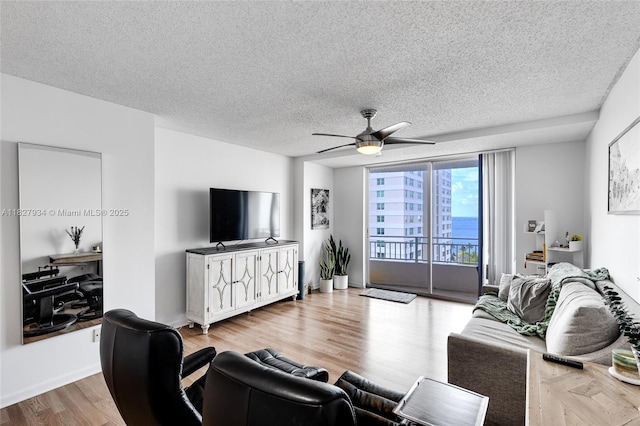 770 Claughton Island Dr Unit 1210, Miami, FL 33131 - living area with a ceiling fan, a textured ceiling, and wood finished floors