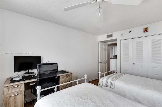 770 Claughton Island Dr Unit 1210, Miami, FL 33131 - bedroom featuring a closet, wood finished floors, a ceiling fan, and a desk