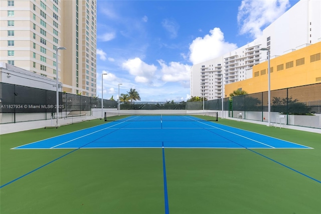 770 Claughton Island Dr Unit 1210, Miami, FL 33131 - view of tennis court with community basketball court
