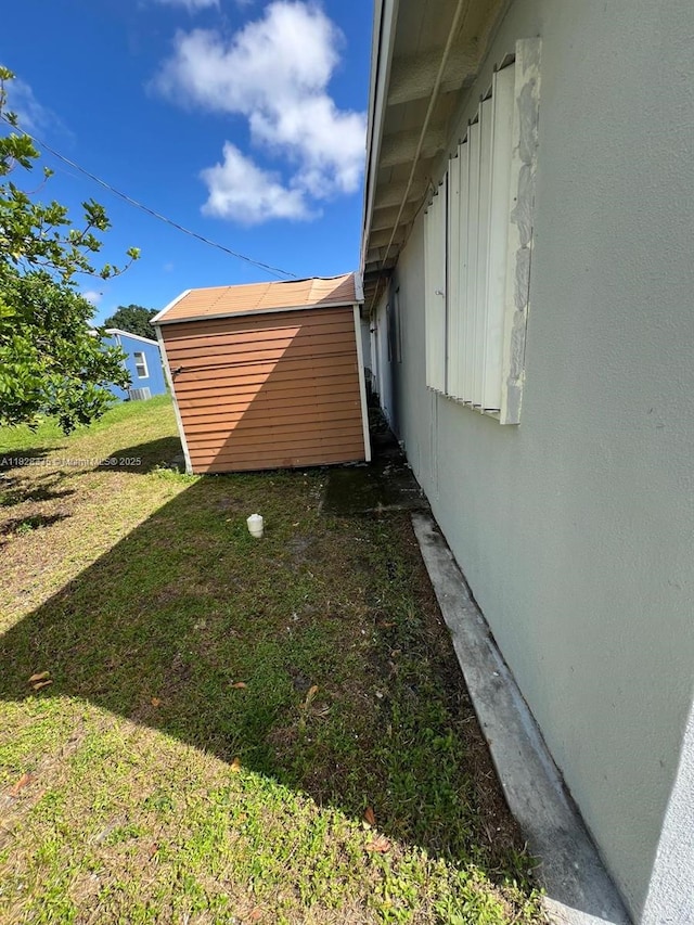 1501 NW 3rd Way, Pompano Beach, FL 33060 - view of grassy yard with a storage unit
