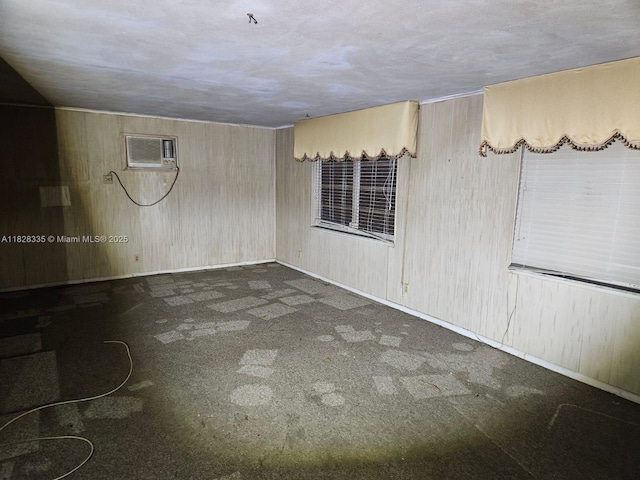 1501 NW 3rd Way, Pompano Beach, FL 33060 - empty room featuring wood walls, carpet flooring, and an AC wall unit
