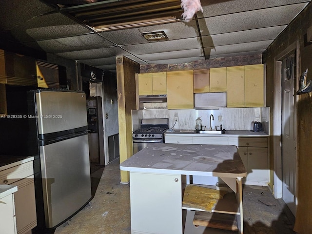 1501 NW 3rd Way, Pompano Beach, FL 33060 - kitchen featuring appliances with stainless steel finishes, extractor fan, tasteful backsplash, and light countertops