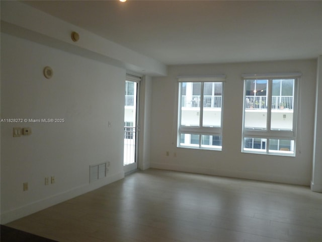 7350 SW 89th St Unit 808S, Miami, FL 33156 - empty room featuring wood finished floors and baseboards