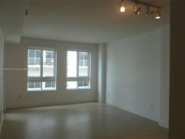 7350 SW 89th St Unit 808S, Miami, FL 33156 - unfurnished room featuring light wood-style floors and baseboards