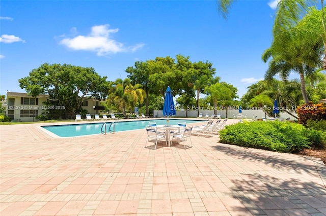 2851 S Palm Aire Dr Unit 205, Pompano Beach, FL 33069 - community pool with a patio