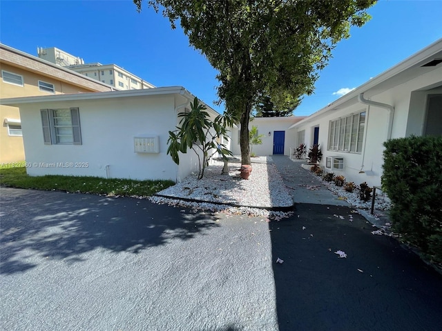 1842 Madison St, Hollywood, FL 33020 - view of side of property featuring stucco siding