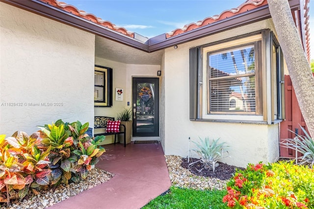 220 SW 113th Ter, Pembroke Pines, FL 33025 - property entrance featuring stucco siding and a tile roof