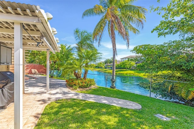 220 SW 113th Ter, Pembroke Pines, FL 33025 - view of yard with a patio area and a water view