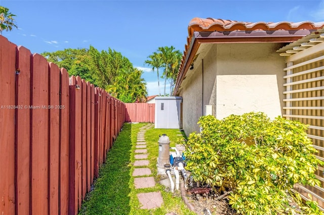 220 SW 113th Ter, Pembroke Pines, FL 33025 - fenced backyard featuring a storage unit