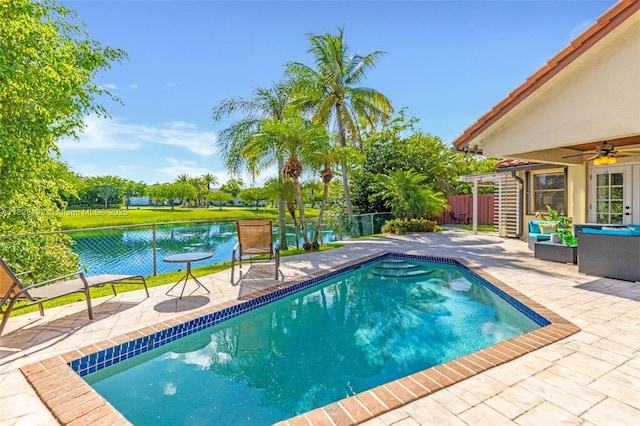 220 SW 113th Ter, Pembroke Pines, FL 33025 - view of pool featuring a patio, ceiling fan, a fenced backyard, and a water view