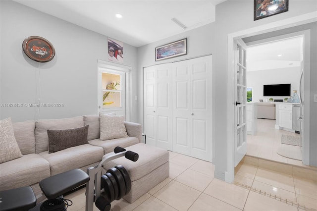220 SW 113th Ter, Pembroke Pines, FL 33025 - living room featuring light tile patterned flooring and recessed lighting
