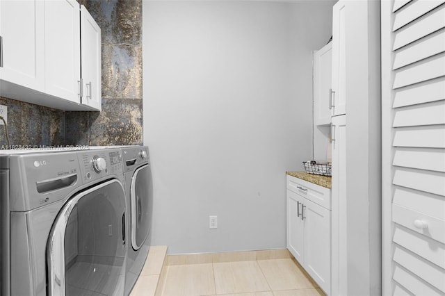 220 SW 113th Ter, Pembroke Pines, FL 33025 - laundry area with washer and dryer, cabinet space, and light tile patterned floors