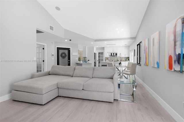 220 SW 113th Ter, Pembroke Pines, FL 33025 - living room with light wood-type flooring and high vaulted ceiling