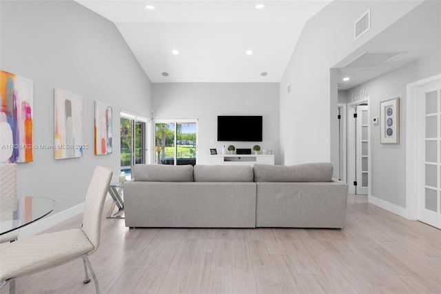 220 SW 113th Ter, Pembroke Pines, FL 33025 - living room with high vaulted ceiling, light wood finished floors, and recessed lighting