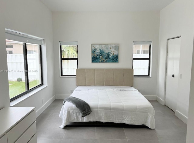 800 SW Tanglewood Cir, Weston, FL 33327 - bedroom featuring baseboards