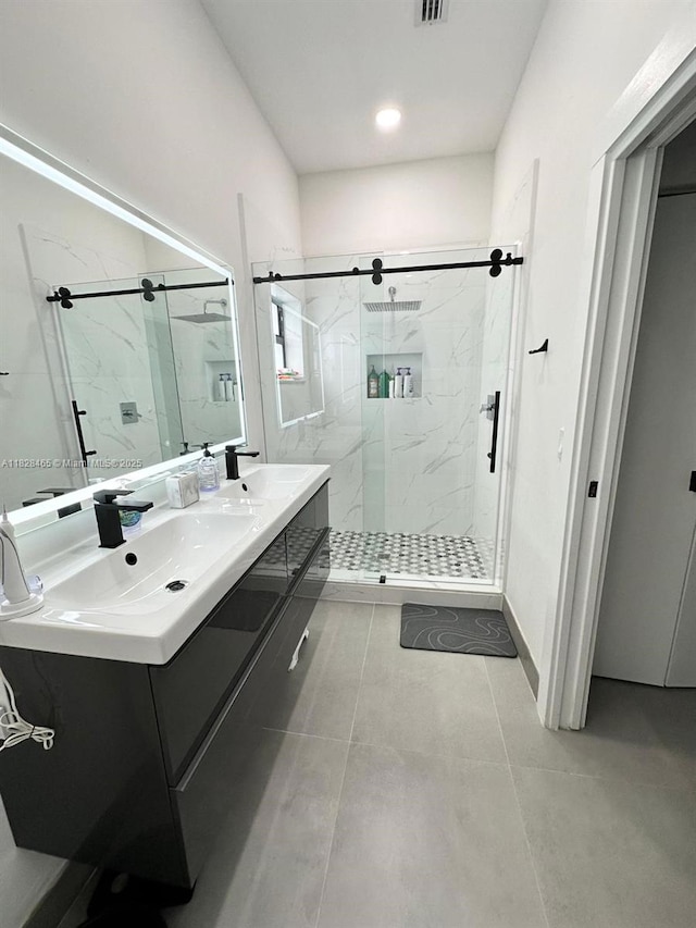 800 SW Tanglewood Cir, Weston, FL 33327 - bathroom featuring a marble finish shower, double vanity, and tile patterned flooring