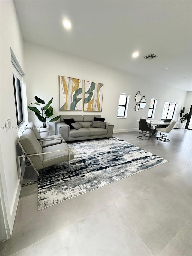 800 SW Tanglewood Cir, Weston, FL 33327 - living room with concrete floors and recessed lighting