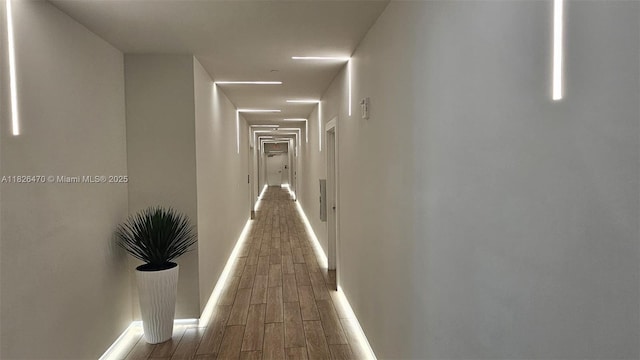 90 SW 3rd St Unit 4110, Miami, FL 33130 - corridor featuring wood tiled floors and baseboards