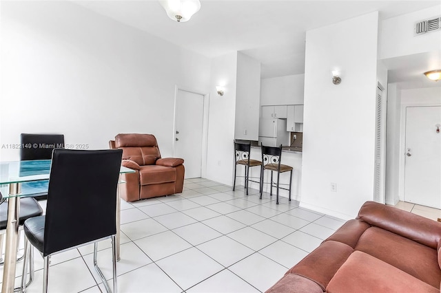 7400 W 20th Ave Unit 315, Hialeah, FL 33016 - living area with light tile patterned floors