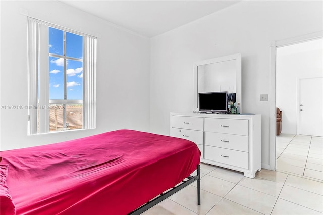 7400 W 20th Ave Unit 315, Hialeah, FL 33016 - bedroom with light tile patterned flooring