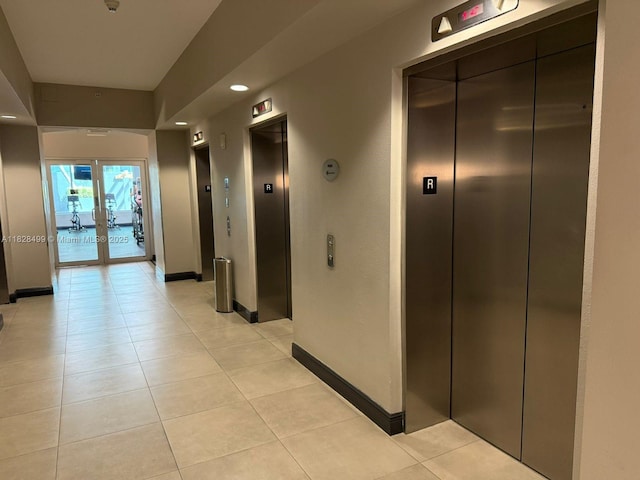 1750 N Bayshore Dr Unit 2707, Miami, FL 33132 - hallway with elevator, french doors, light tile patterned floors, and recessed lighting