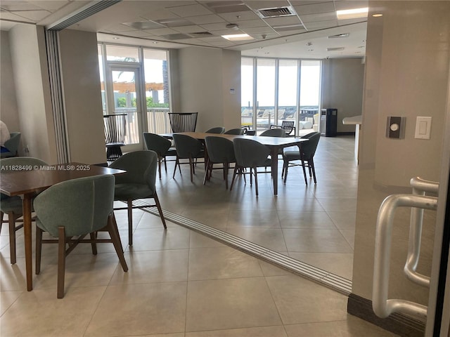 1750 N Bayshore Dr Unit 2707, Miami, FL 33132 - dining space featuring plenty of natural light, light tile patterned flooring, and expansive windows