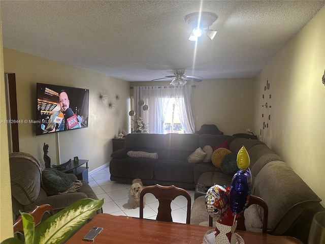 1900 W 54th St Unit 113, Hialeah, FL 33012 - living area with light tile patterned flooring, a ceiling fan, and a textured ceiling