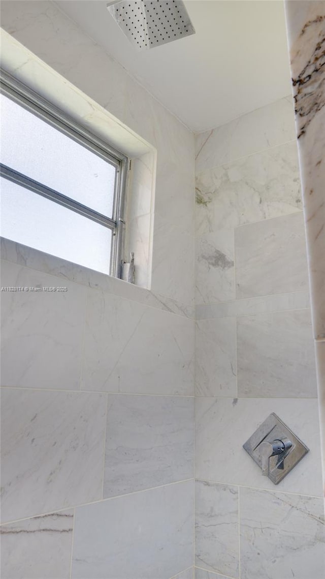 16801 NE 13th Ave Unit 202, Miami, FL 33162 - bathroom featuring tiled shower