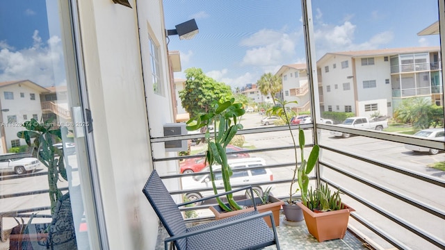 16801 NE 13th Ave Unit 202, Miami, FL 33162 - balcony with a residential view