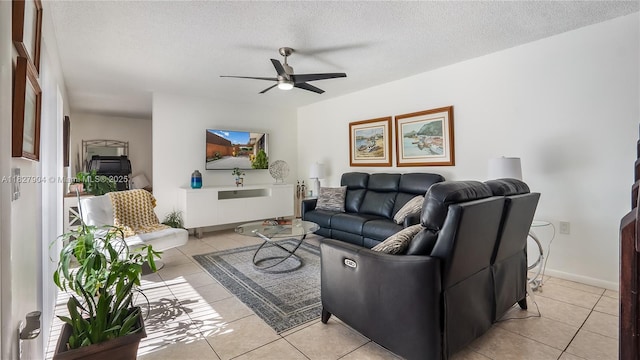 9109 SW 20th St, Davie, FL 33324 - living room featuring a ceiling fan, light tile patterned floors, and a textured ceiling