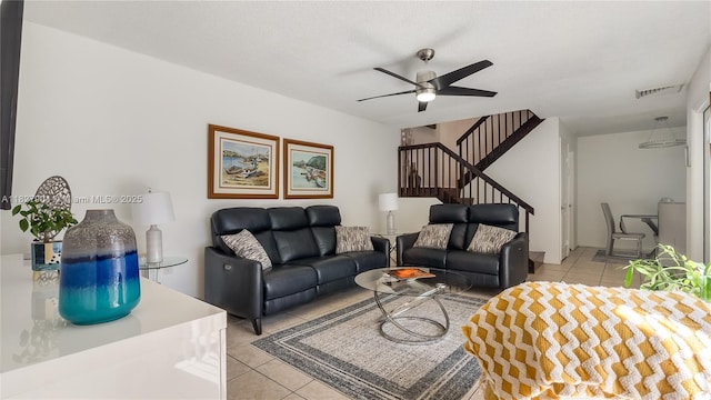 9109 SW 20th St, Davie, FL 33324 - living area featuring light tile patterned floors, ceiling fan, and stairs