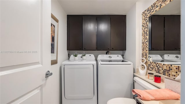 9109 SW 20th St, Davie, FL 33324 - laundry room featuring washing machine and clothes dryer and cabinet space