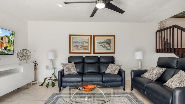 9109 SW 20th St, Davie, FL 33324 - living room with light tile patterned floors, ceiling fan, and a textured ceiling