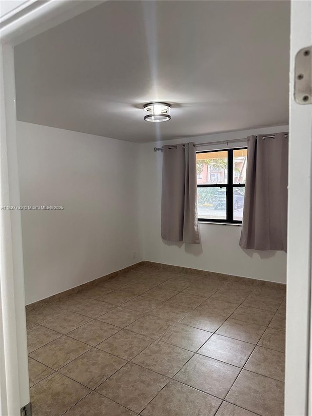 8100 Geneva Ct Unit 142, Doral, FL 33166 - spare room with tile patterned floors