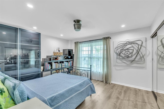 805 W Oakland Park Blvd Unit E14, Oakland Park, FL 33311 - bedroom featuring wood finished floors and recessed lighting
