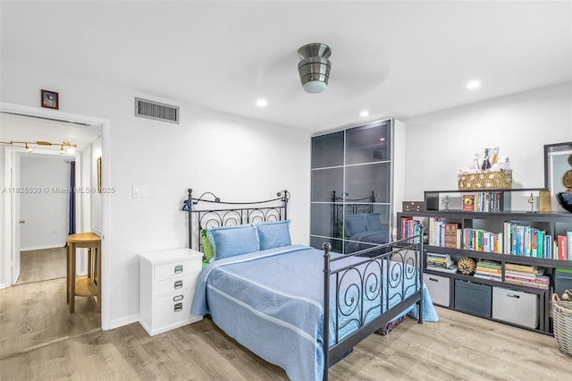 805 W Oakland Park Blvd Unit E14, Oakland Park, FL 33311 - bedroom featuring wood finished floors and recessed lighting