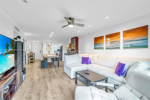 805 W Oakland Park Blvd Unit E14, Oakland Park, FL 33311 - living area featuring crown molding, ceiling fan, recessed lighting, and light wood-style floors