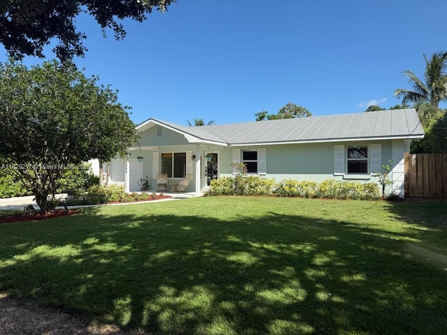 8994 SE Colony St, Hobe Sound, FL 33455 - single story home featuring a garage and a metal roof