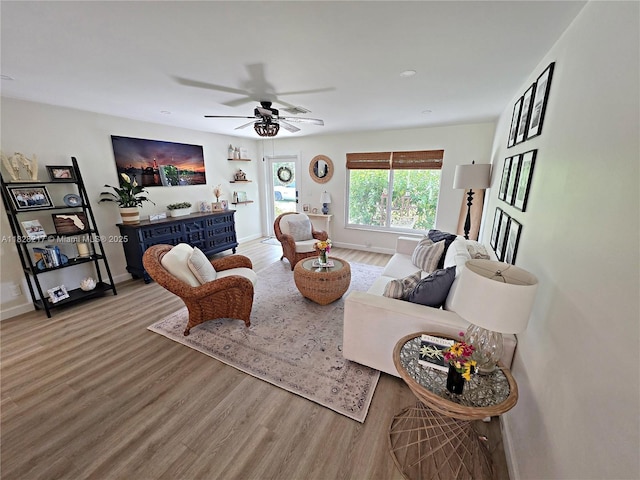 8994 SE Colony St, Hobe Sound, FL 33455 - living room with wood finished floors and a ceiling fan