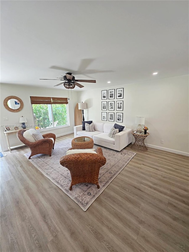 8994 SE Colony St, Hobe Sound, FL 33455 - living room featuring wood finished floors, a ceiling fan, and recessed lighting