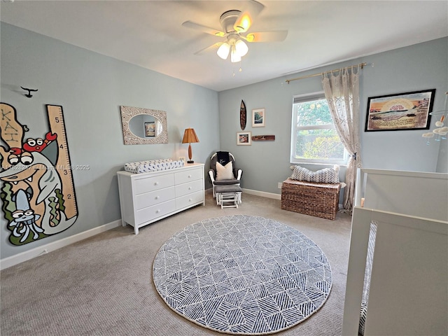 8994 SE Colony St, Hobe Sound, FL 33455 - bedroom featuring light colored carpet and ceiling fan